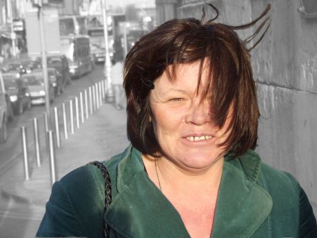 Cllr. Joan Collins outside City Hall