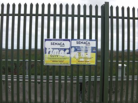 Edited sign on the Aughoose compound