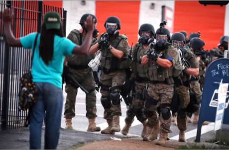 Click on image to see full-sized version So much for peaceful protest! Militarised police respond with "Show us your papers or we'll kill you you terrorist"